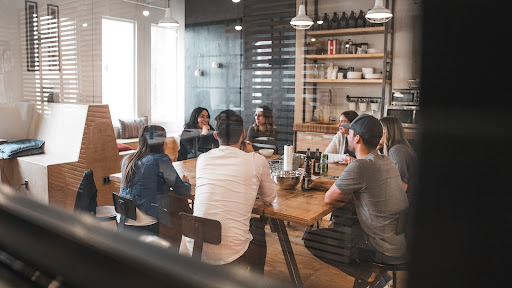 a team of people around a table