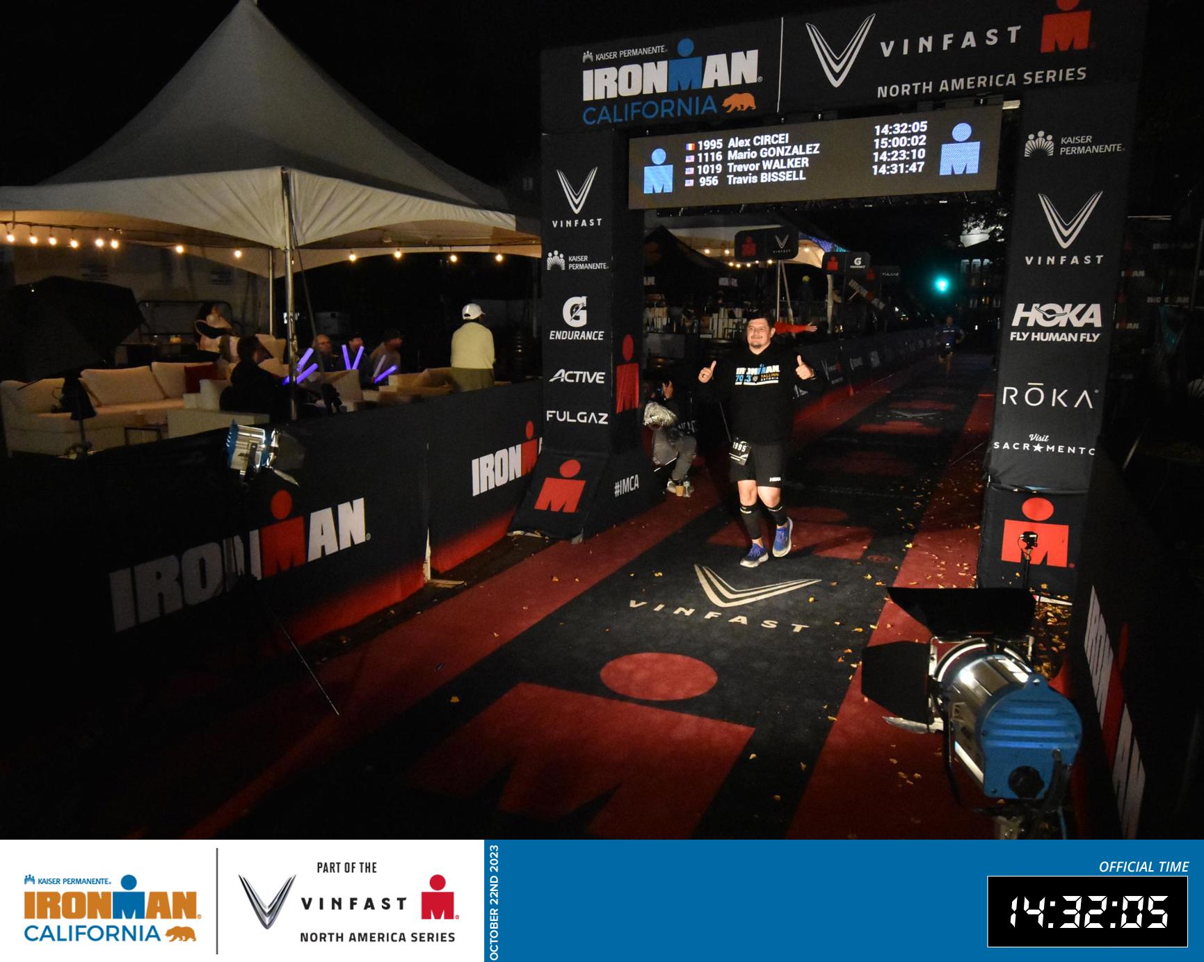 Alex Circei finishing an Ironman triathlon
